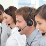 Co-workers with headset on In A Call Center